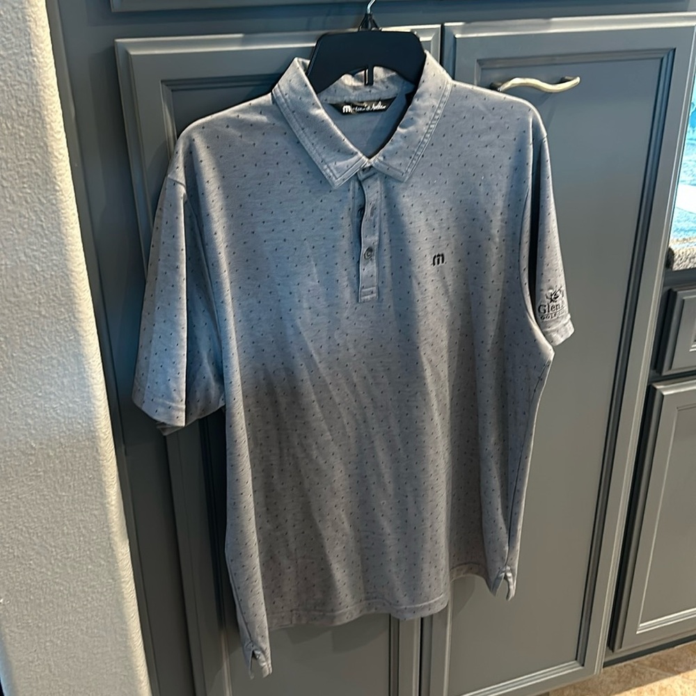 Travis Natthew
Golf shirt